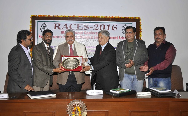 College Principal Dr. Khushvinder Kumar and Prof. Surindra Lal, Member Managing Committee felicitating the Chief Guest Prof. (Dr.) P. S. Jaswal, Vice Chancellor, Rajeev Gandhi National University of Law, Patiala